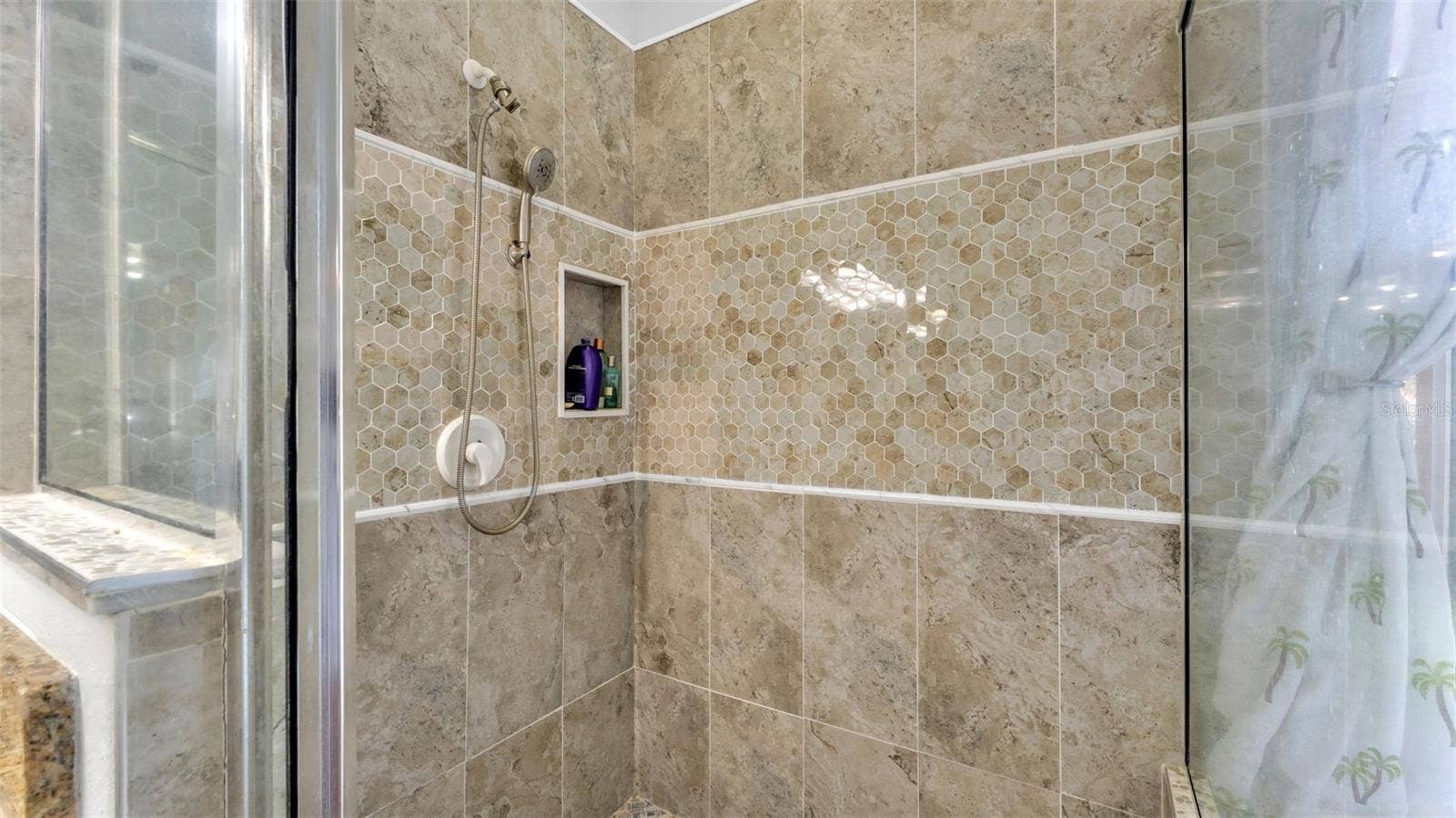6626 ROYAL FOREST DR, Lakeland, FL 33811 Beautiful remodeled ensuite bathroom with soaking tub, walk-in shower, double vanities, and private toilet room