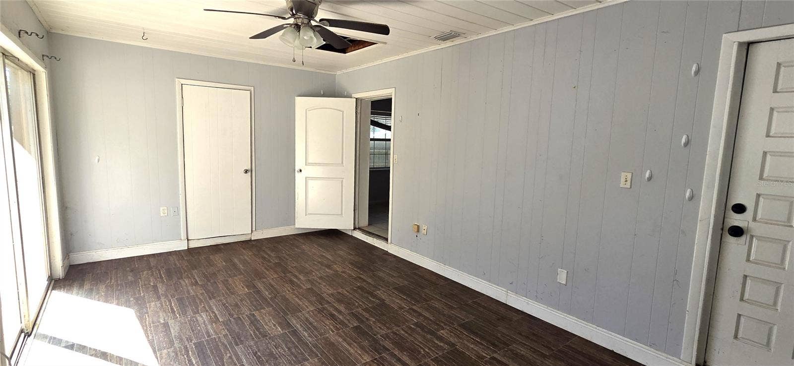 Office with separate entrance to front of house and Slider to left side of house