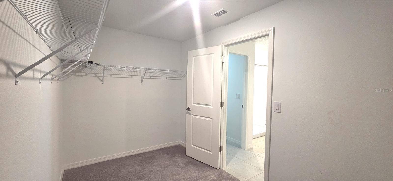 Primary Bedroom Walk-in Closet