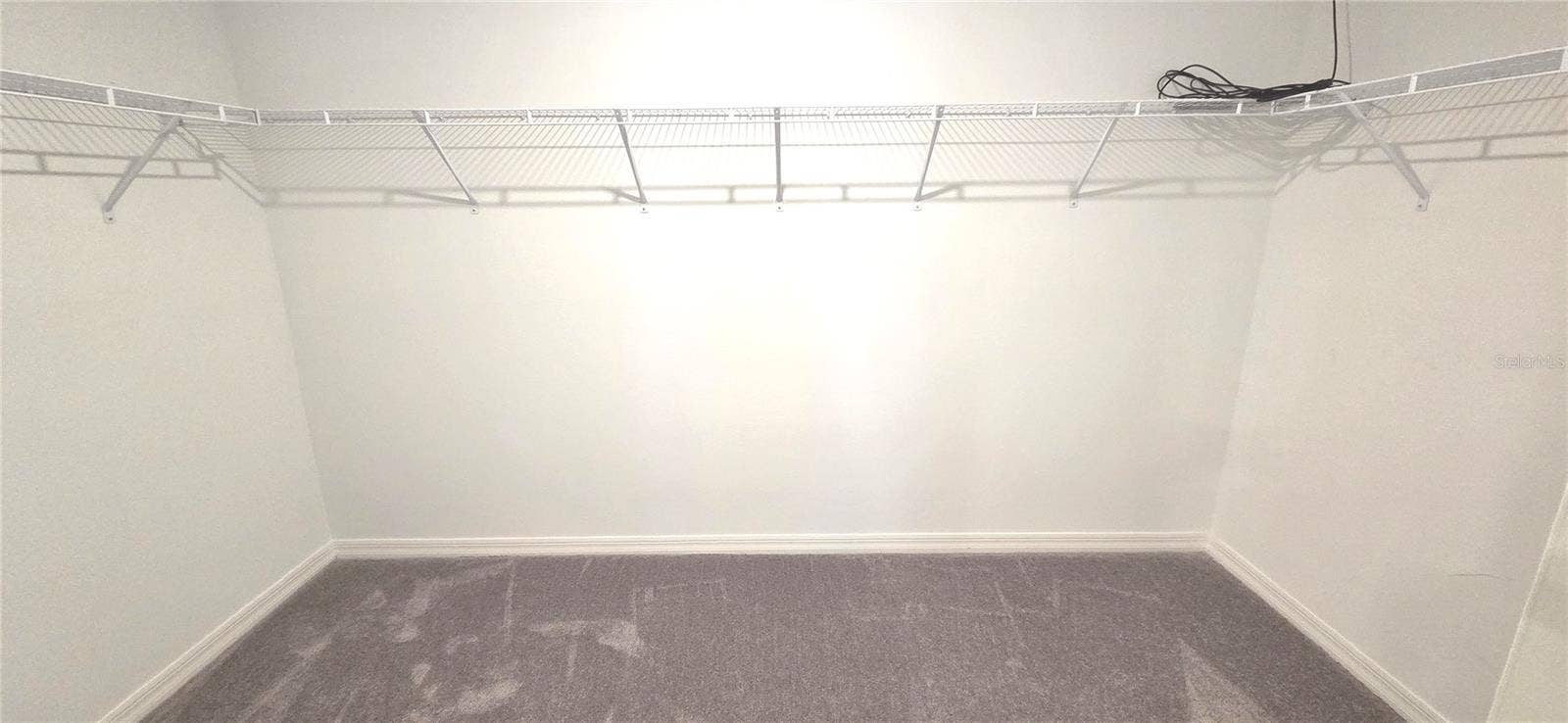 Primary Bedroom Walk-in Closet