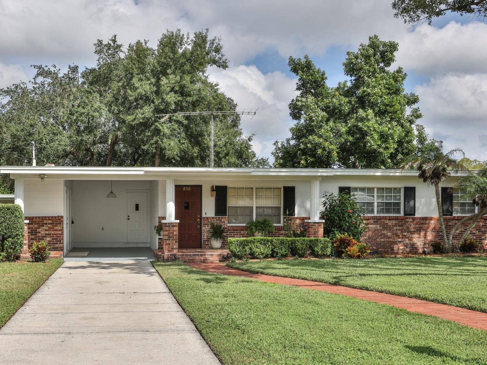 650 PARK LANE, Bartow, FL 33830 Front of the home with a one car carport.