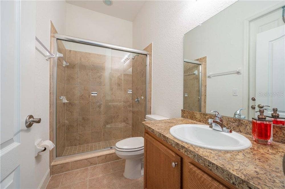 1652 LEMON AVENUE, Winter Haven, FL 33881 Ensuite to Bedroom 4