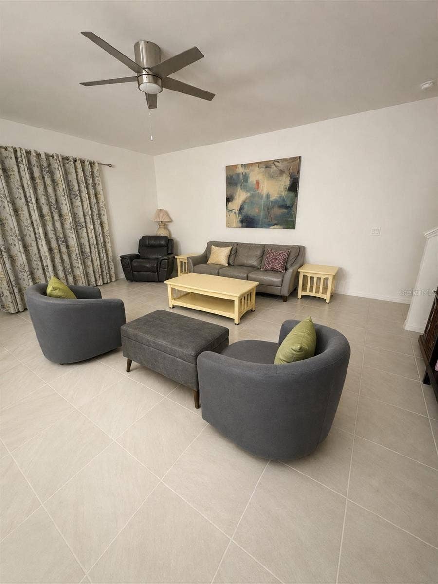 7128 DILLY LAKE AVENUE, Groveland, FL 34736 Living room