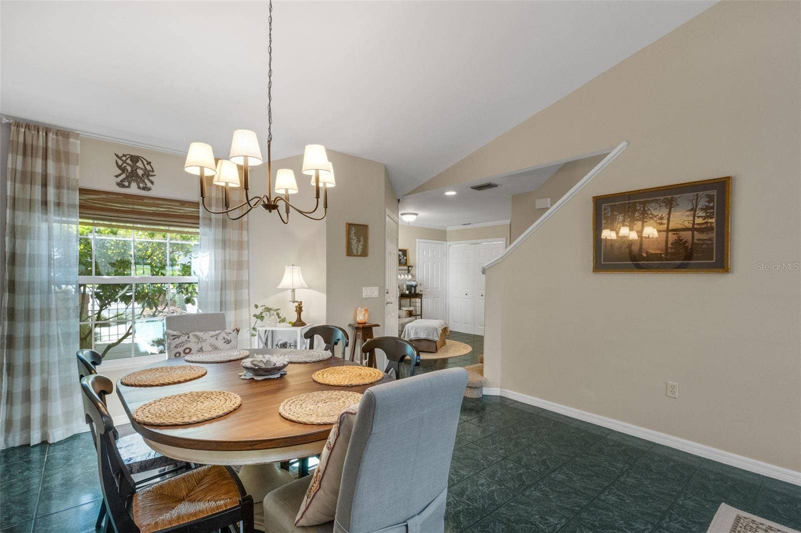 1113 WATERFALL LANE, Lakeland, FL 33803 Beautiful large windows and French door allow in golden natural light.