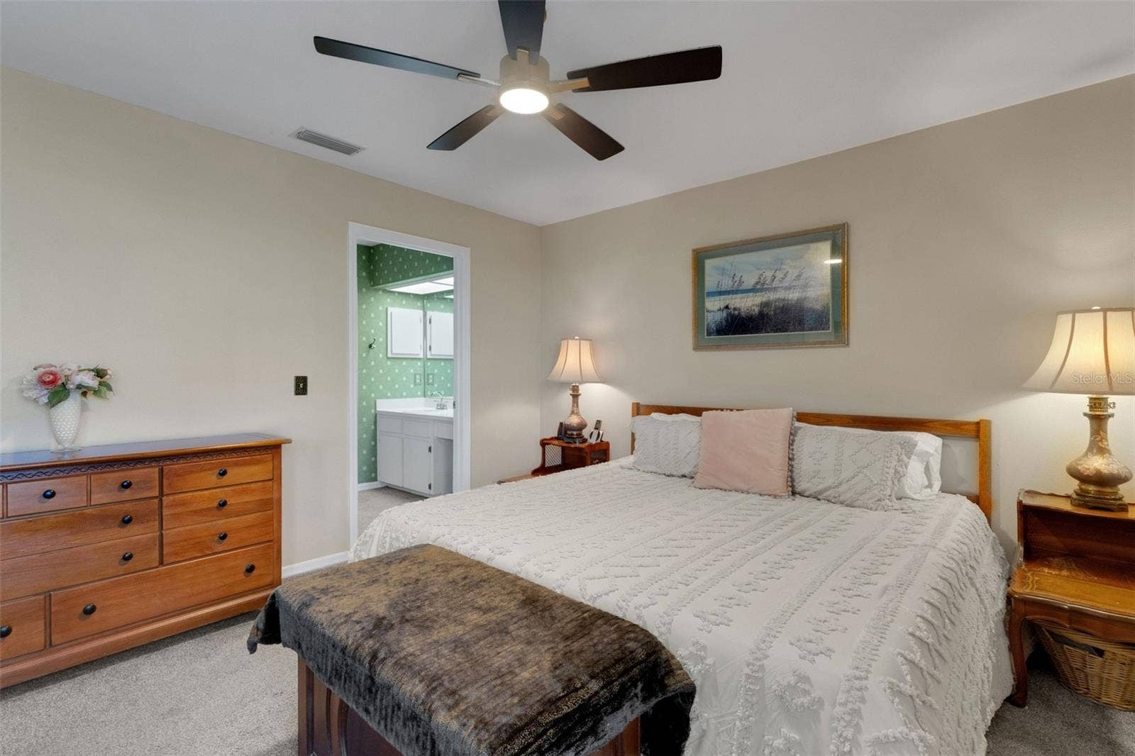 1113 WATERFALL LANE, Lakeland, FL 33803 with its ensuite bathroom and walk-in closet.