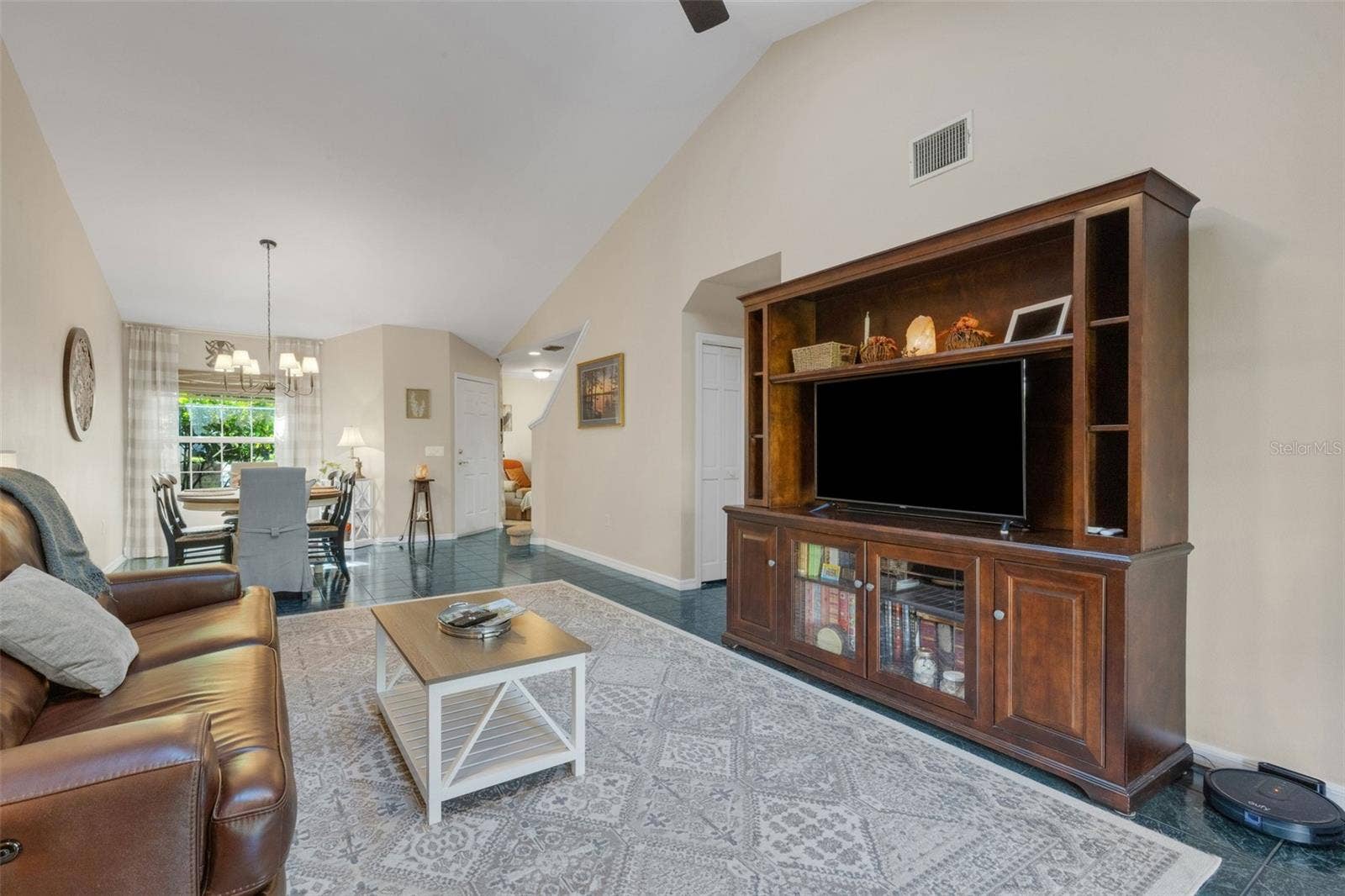 1113 WATERFALL LANE, Lakeland, FL 33803 Volume ceilings draw the eye upward and make the space see even larger.