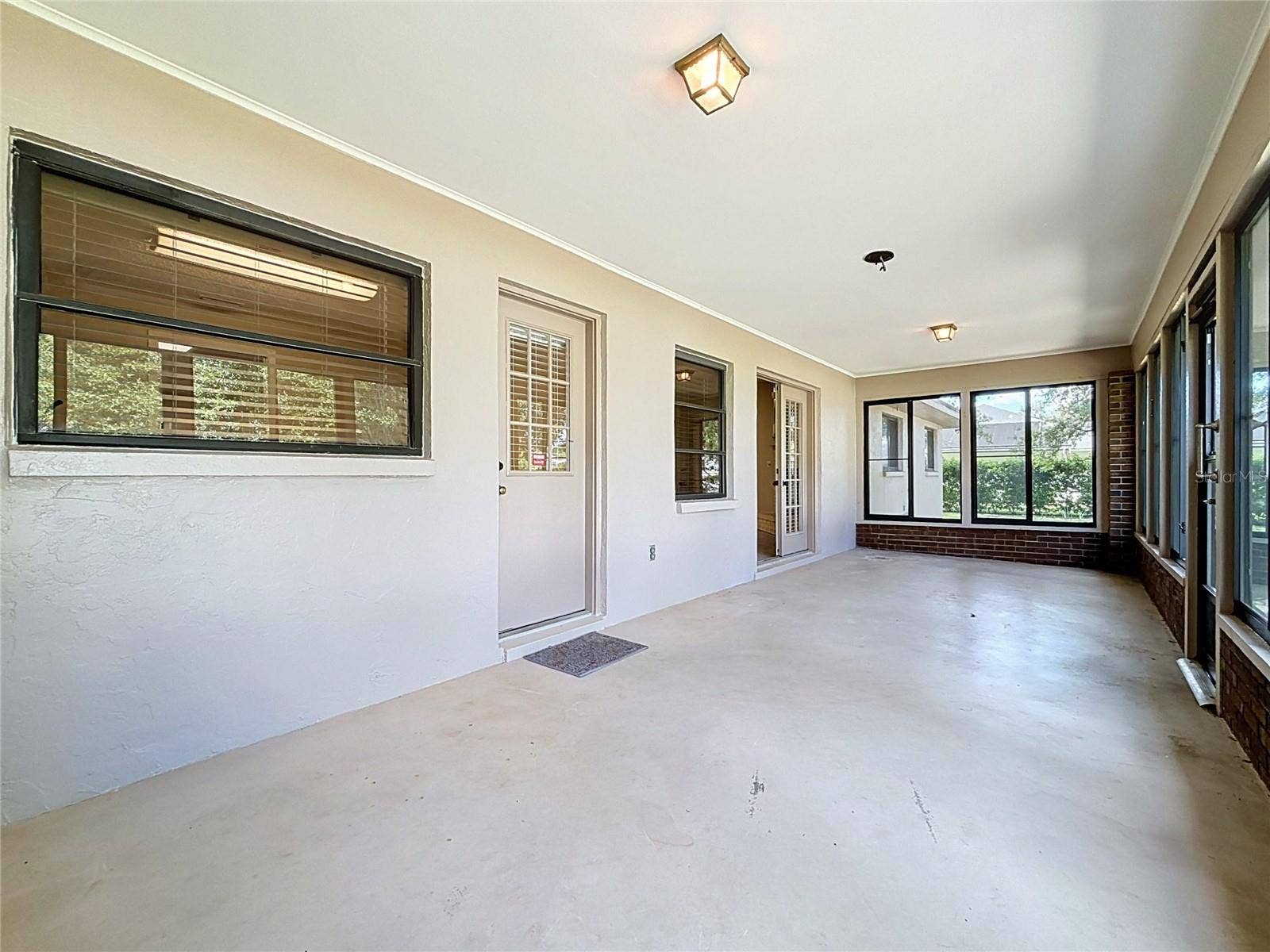 French doors open to Great Room and smaller door to bonus room