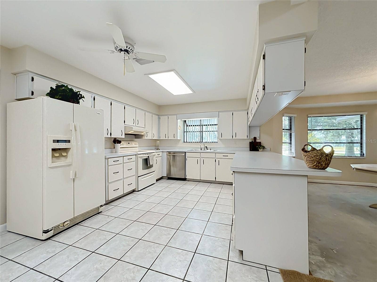 Kitchen features ceramic tile flooring