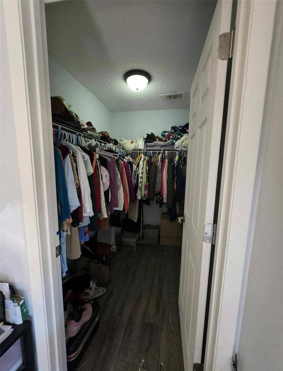 319 OAK TRACK PASS, Ocala, FL 34472 Walking closet Bed 1