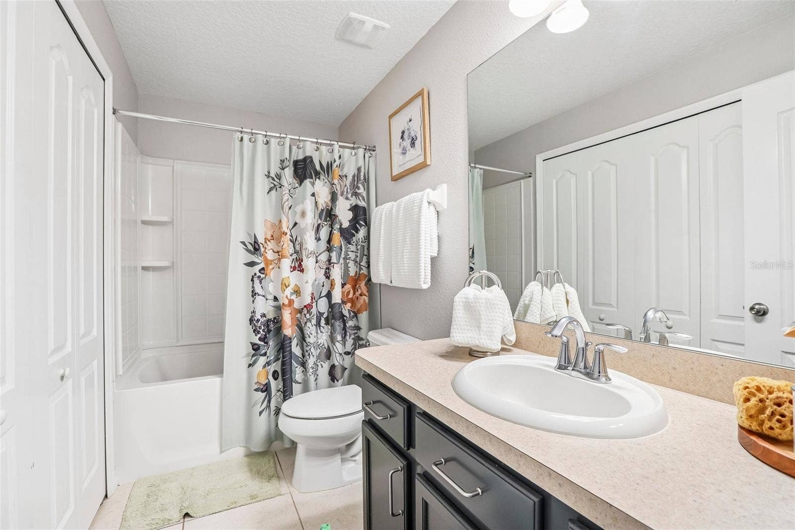 5414 QUARRY ROCK ROAD, #5414, Lakeland, FL 33809 Upstairs Guest bathroom with laundry closet!