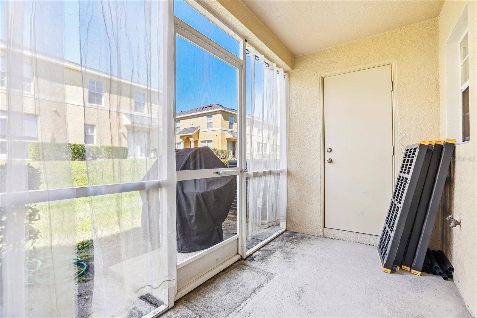 5414 QUARRY ROCK ROAD, #5414, Lakeland, FL 33809 Screened in patio with outdoor storage!