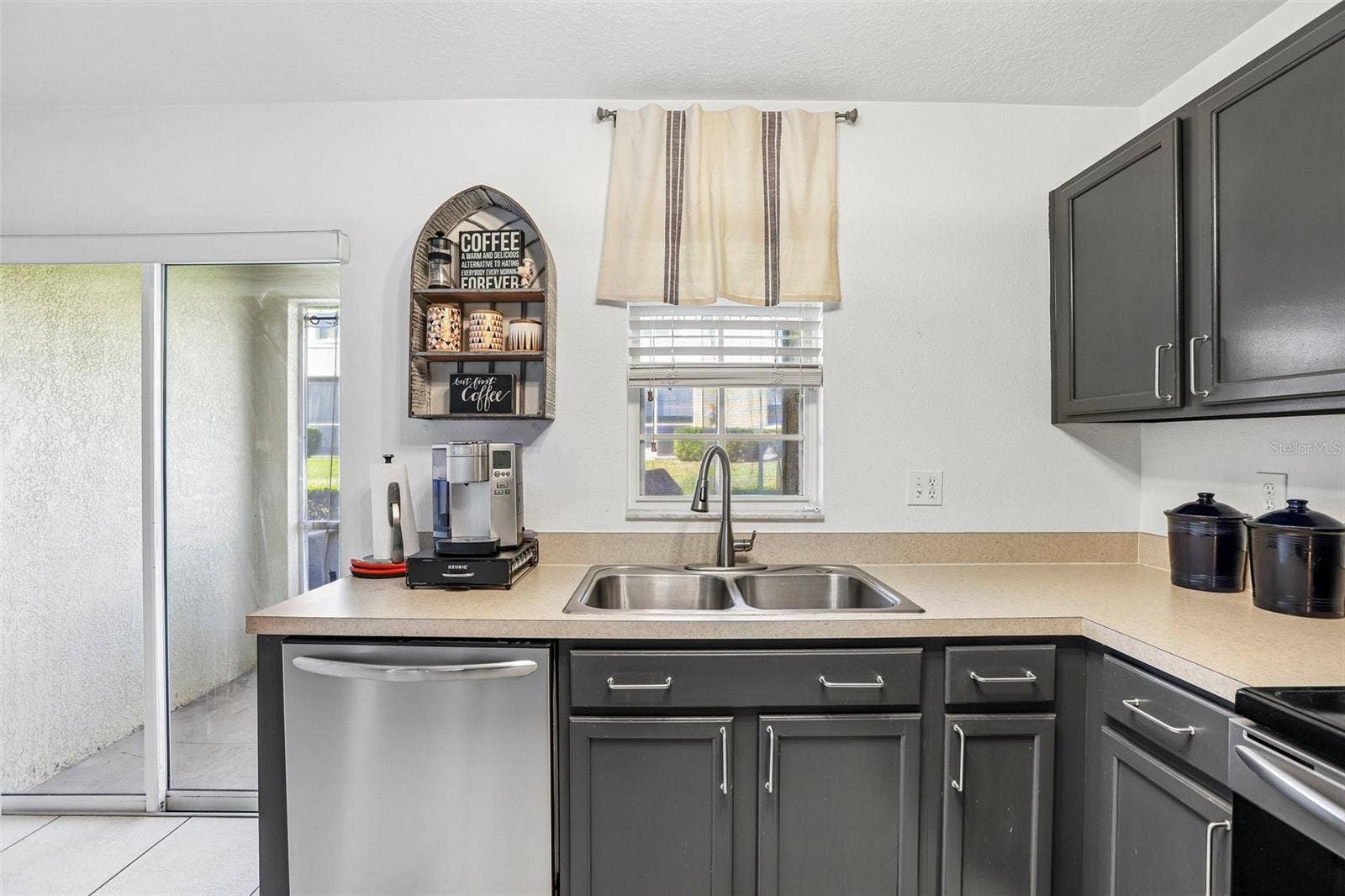 5414 QUARRY ROCK ROAD, #5414, Lakeland, FL 33809 Kitchen located at the rear of the home, allowing natural light to pour in!
