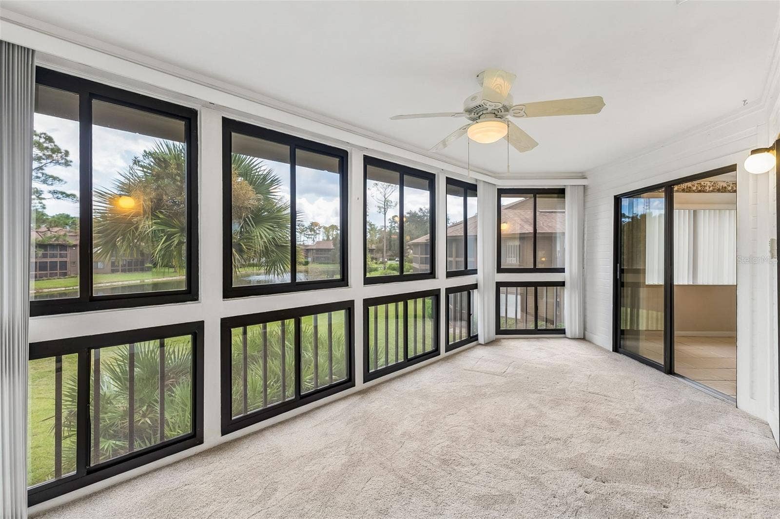 2 SALISBURY COURT, Palm Coast, FL 32137 Enclosed Lanai Under Air overlooking the Water