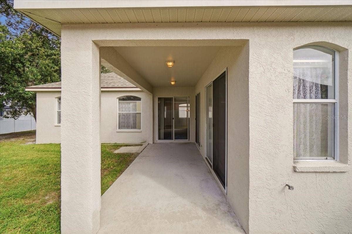 1731 BROOKSTONE WAY, Plant City, FL 33566 REAR COVERED LANAI/PATIO