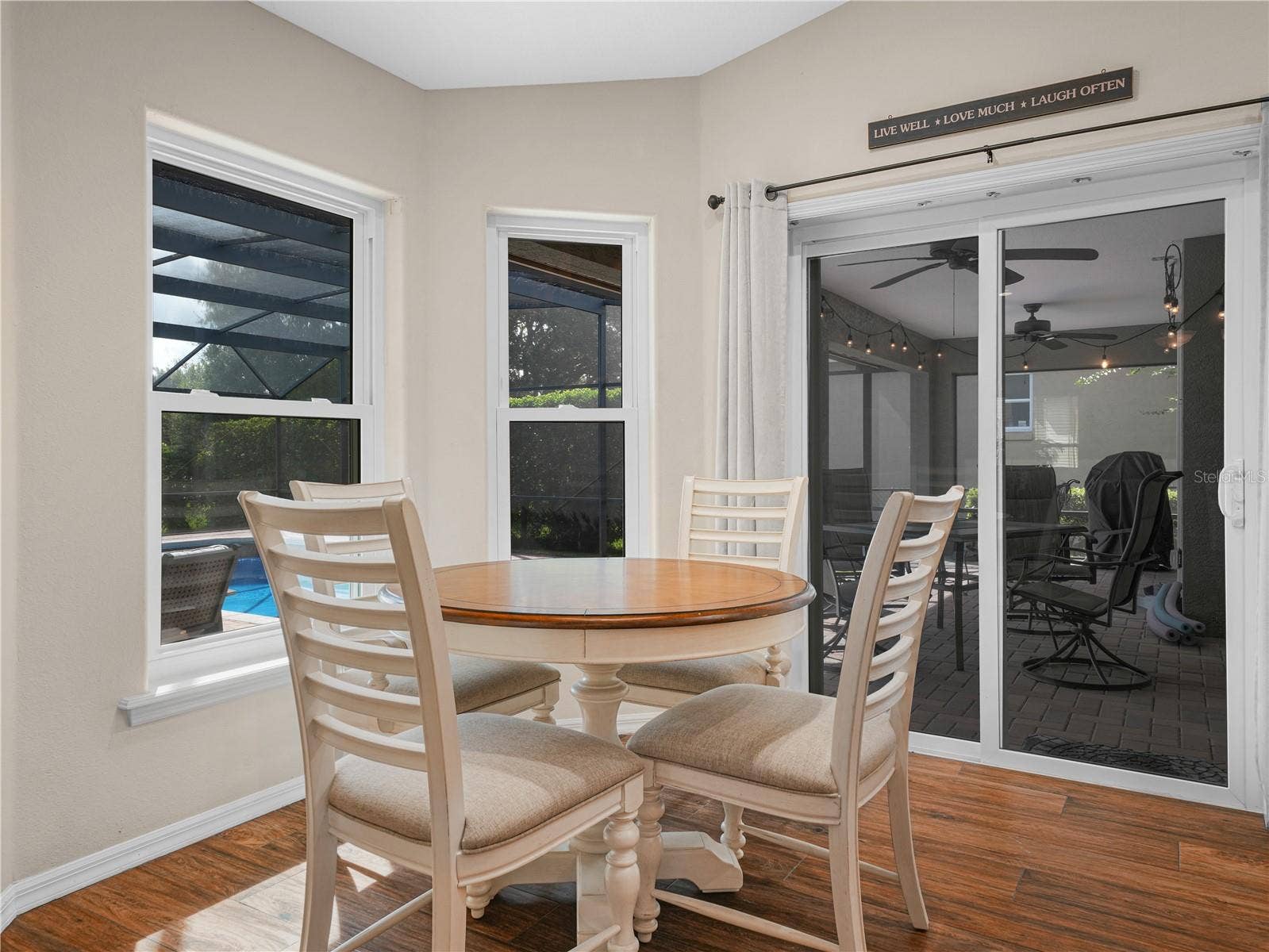 5868 HIGH RIDGE LOOP, Lakeland, FL 33812 Eating area in kitchen overlooks pool and back yard for morning time together with the family