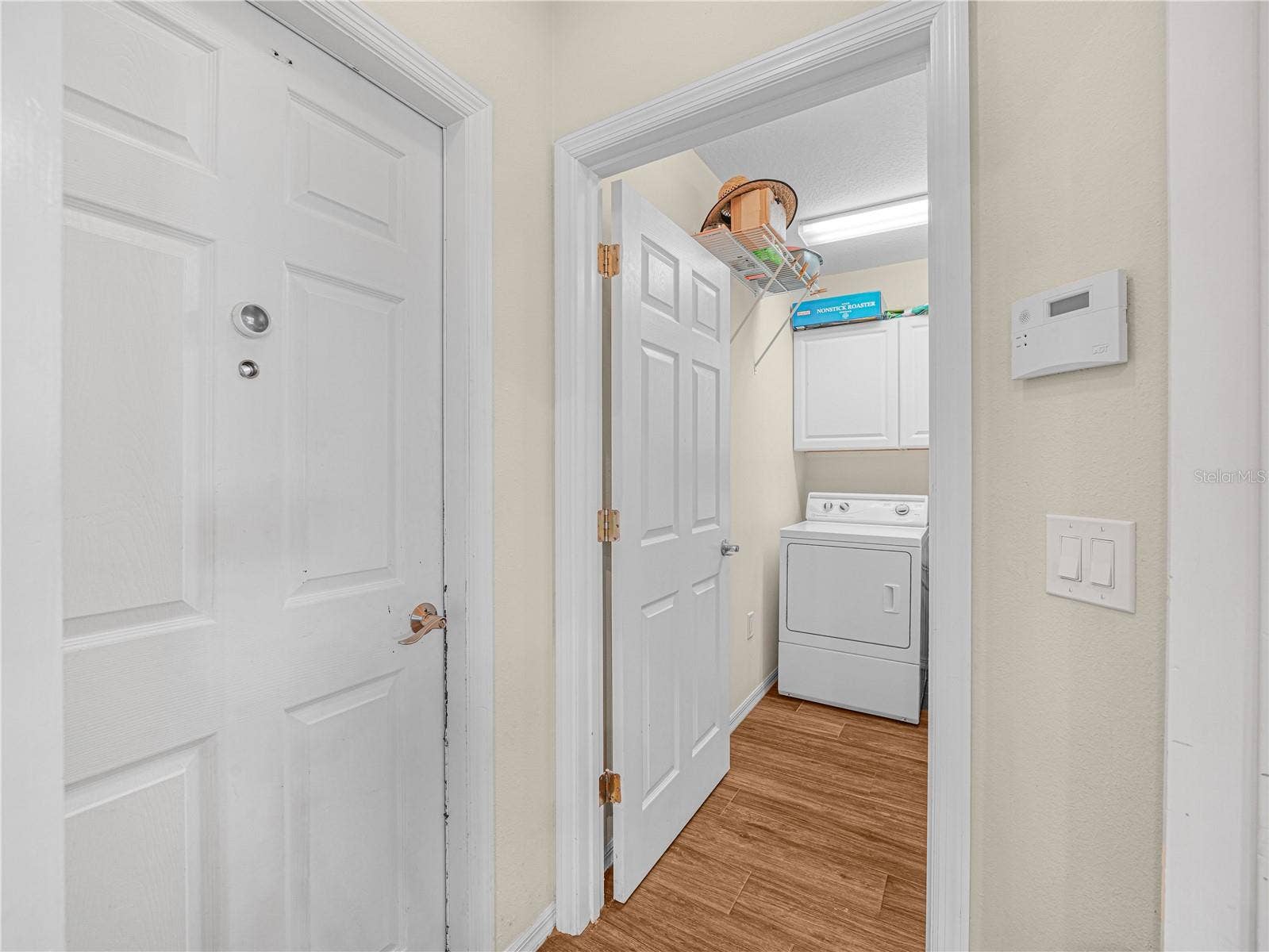 5868 HIGH RIDGE LOOP, Lakeland, FL 33812 Laundry area with cabinets