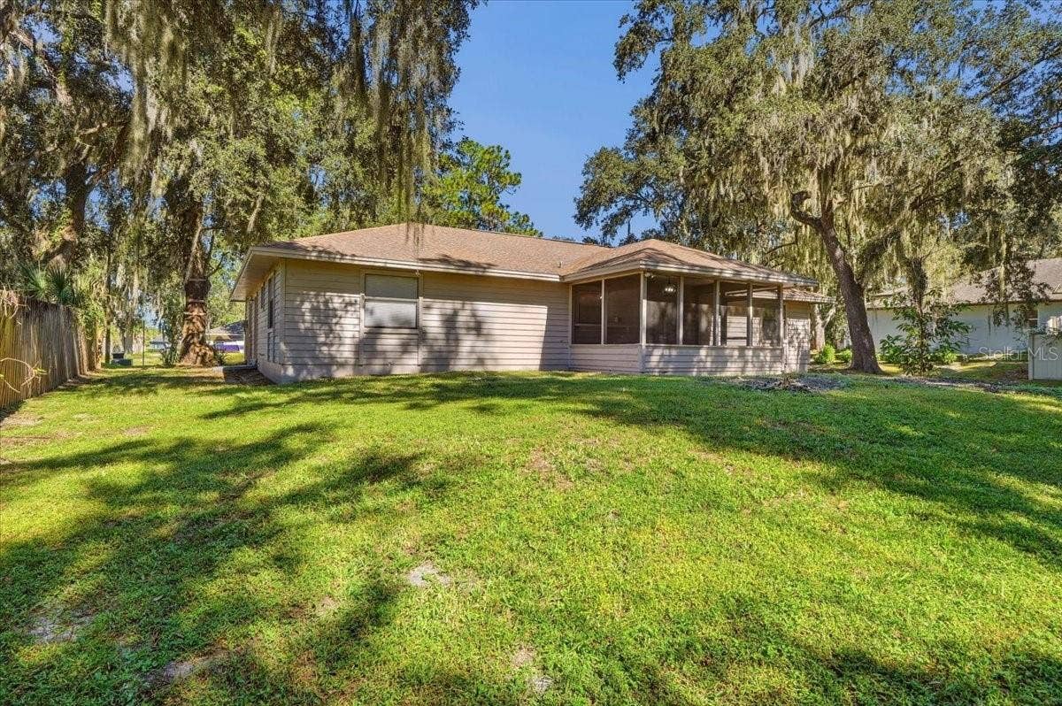 5244 QUIET CREEK LANE, Lakeland, FL 33811 Watch the sunrise from the back porch in the mornings.