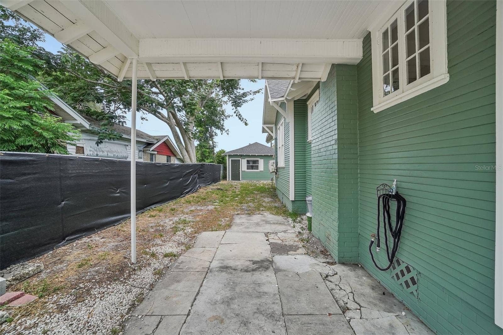 1533 E ELM ROAD, Lakeland, FL 33801 Carport View To Backyard