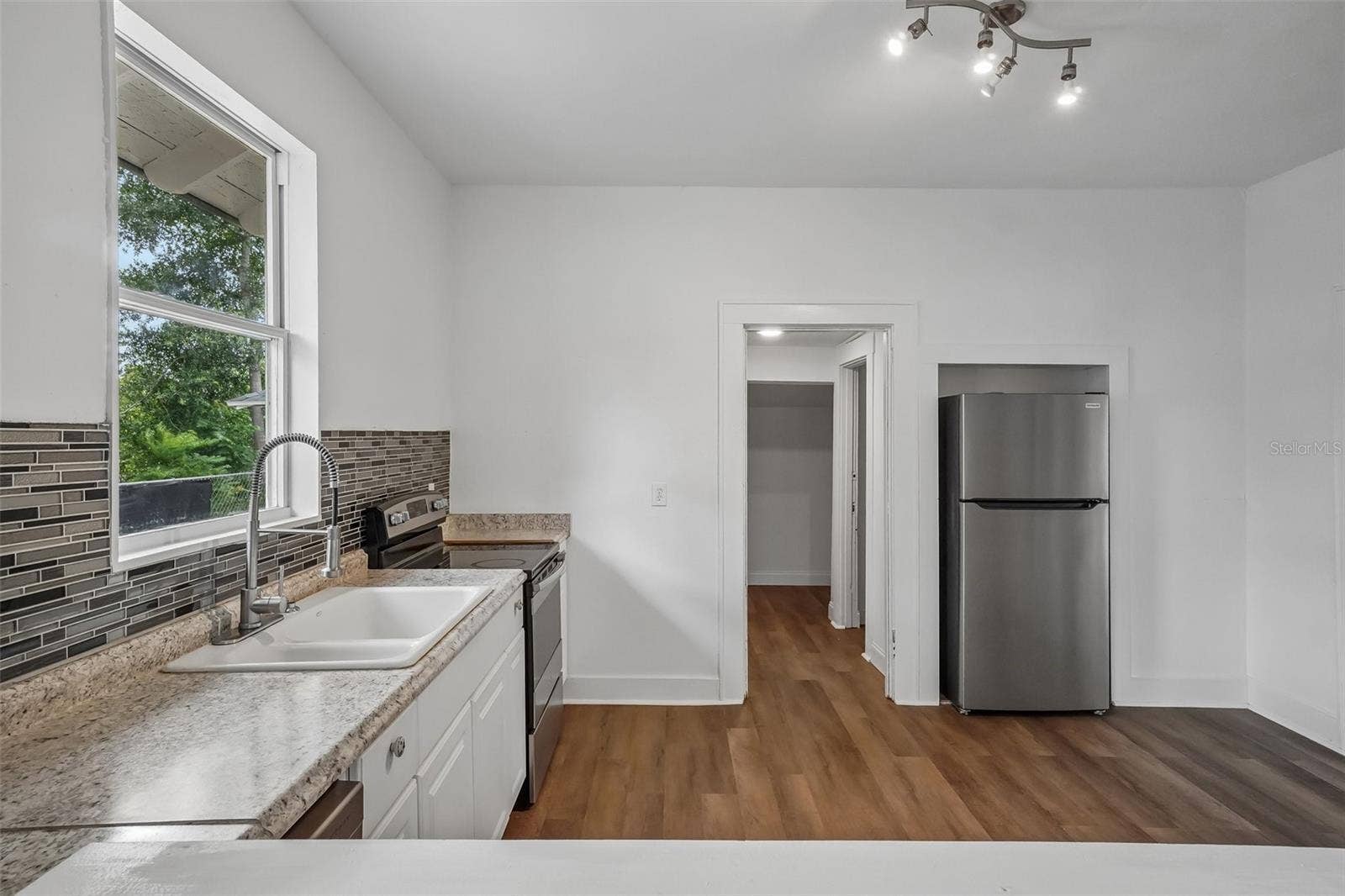 1533 E ELM ROAD, Lakeland, FL 33801 Kitchen - View from Viewing Window