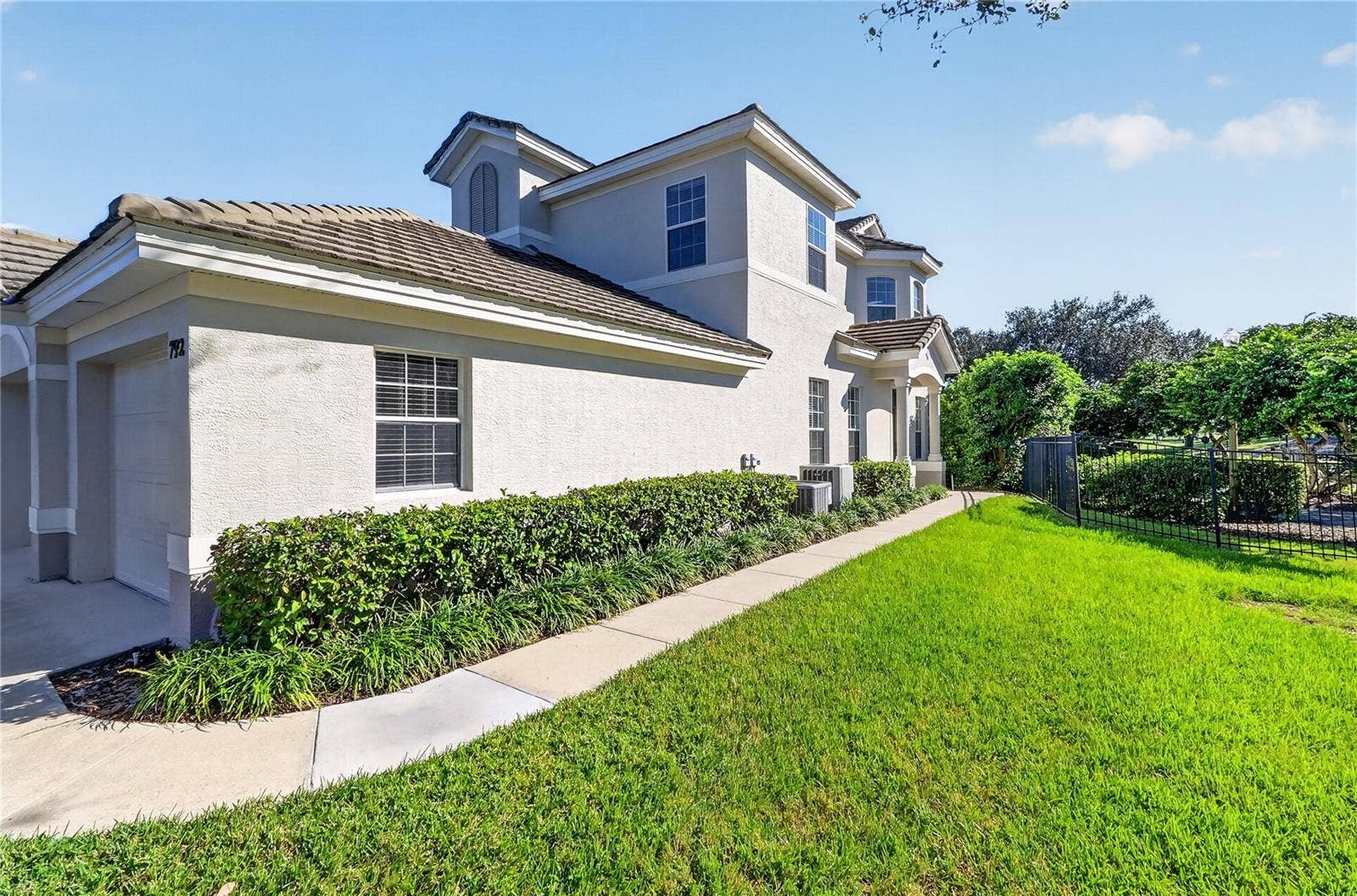 792 GRASSLANDS VILLAGE CIRCLE, #792, Lakeland, FL 33803 Sidewalk to Front Door