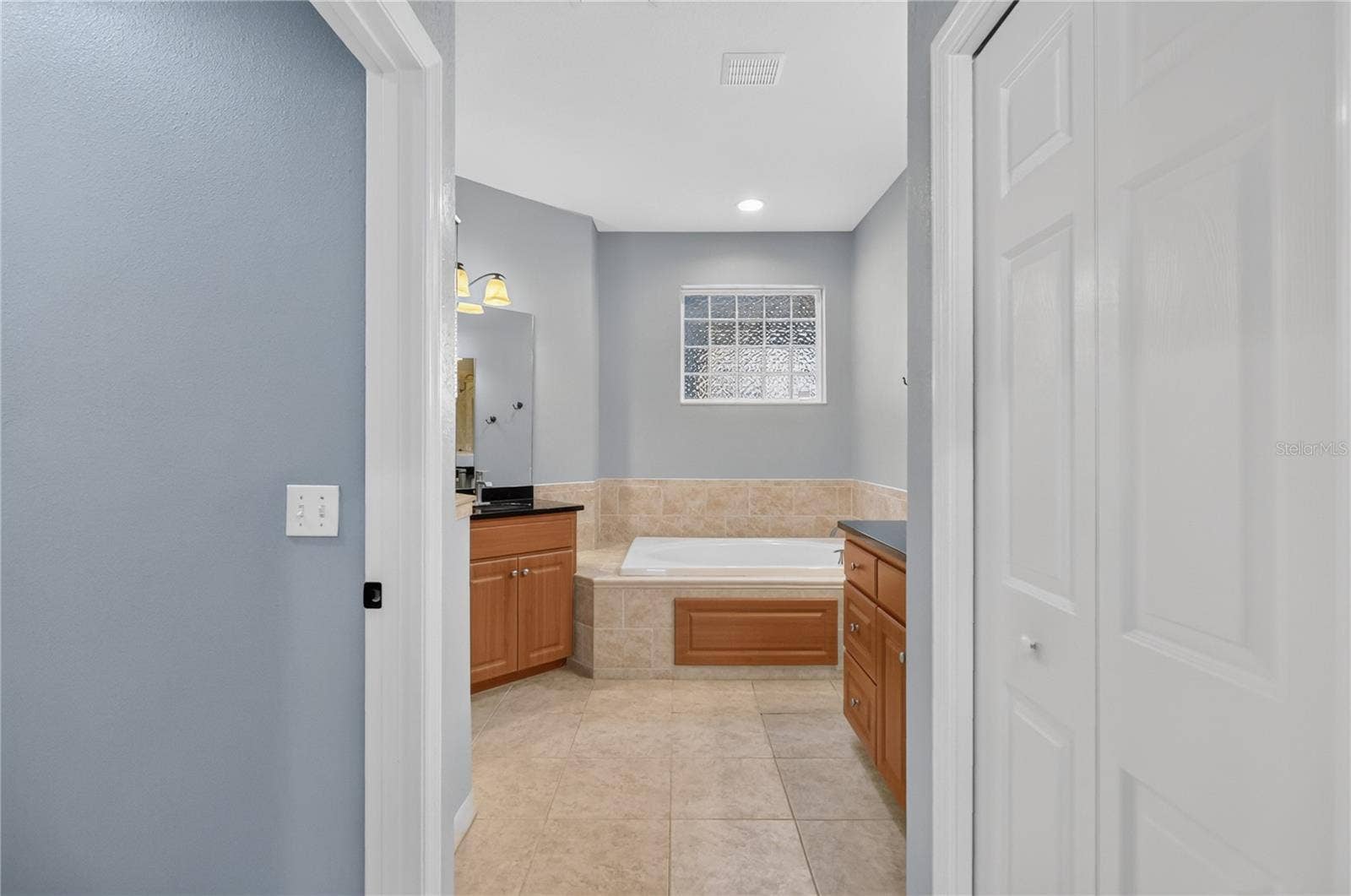 792 GRASSLANDS VILLAGE CIRCLE, #792, Lakeland, FL 33803 LOOKING INTO MASTER BATHROOM