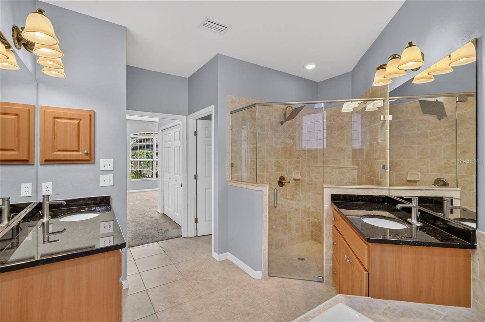 792 GRASSLANDS VILLAGE CIRCLE, #792, Lakeland, FL 33803 Master Bathroom with Dual Sinks and Walk In Shower