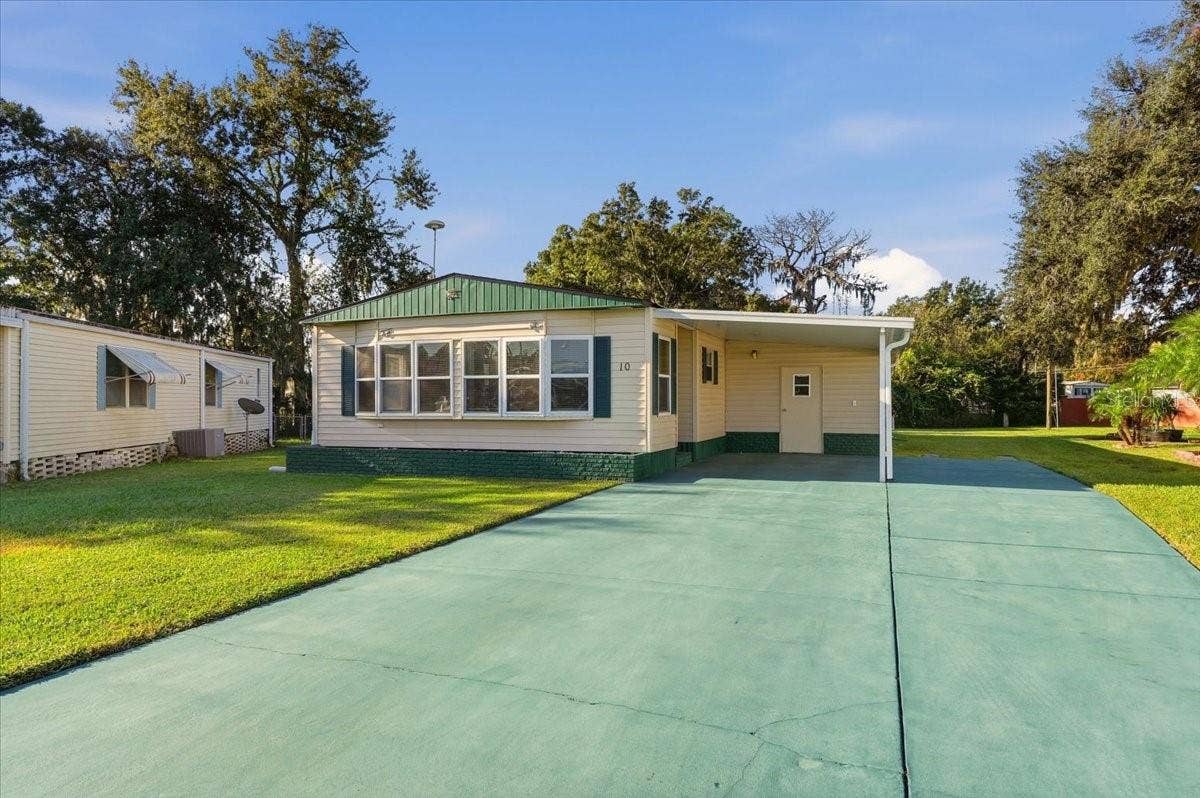 1610 REYNOLDS ROAD, #10, Lakeland, FL 33801 Own your land! Spacious Lot 10 in Citrus Woods Estates