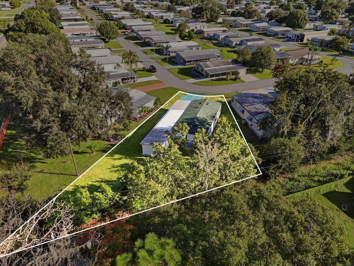 1610 REYNOLDS ROAD, #10, Lakeland, FL 33801 One of the larger lots in the community, along the exterior. .25 acres