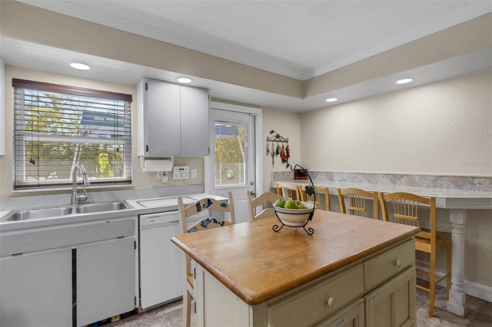 4260 53RD AVENUE N, St Petersburg, FL 33714 Kitchen Towards Kitchen Bar and Back Door