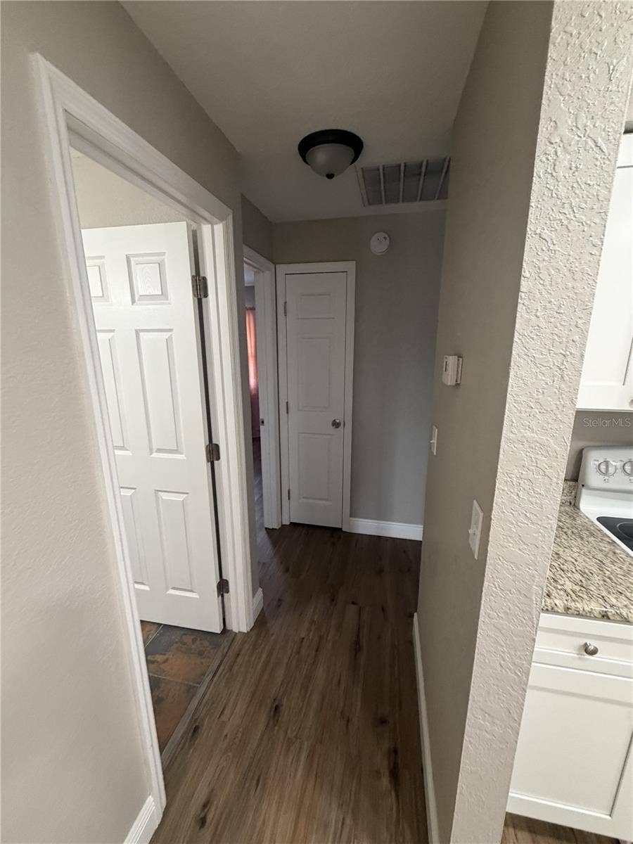 220 VILLAGE CREST COURT, Lakeland, FL 33809 Hallway to 2 bedrooms