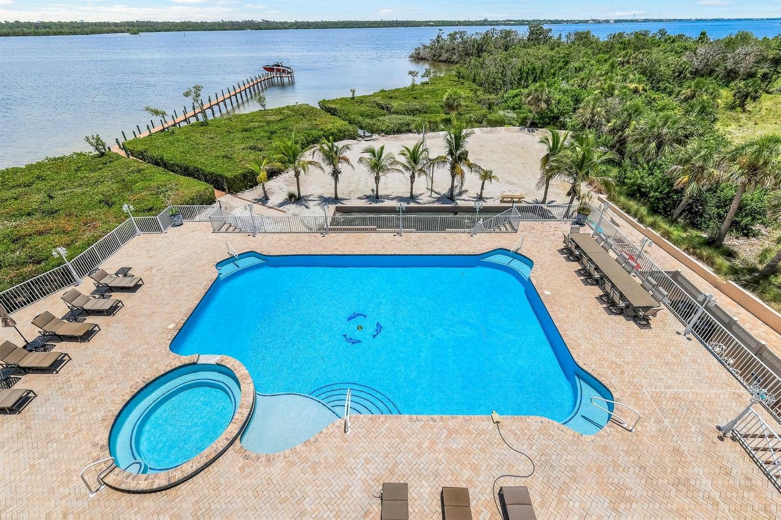 7159 MANASOTA KEY ROAD, Englewood, FL 34223 Pool spa volley ball court private dock with 10K lb lift