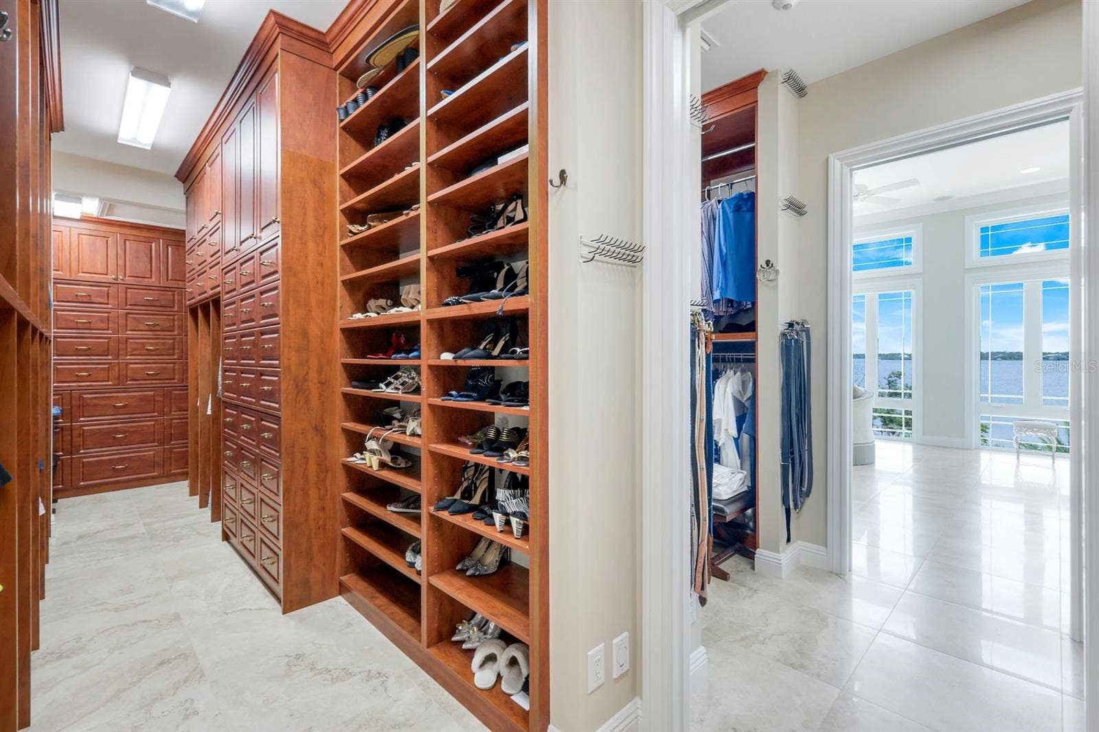 7159 MANASOTA KEY ROAD, Englewood, FL 34223 primary bedroom custom closet