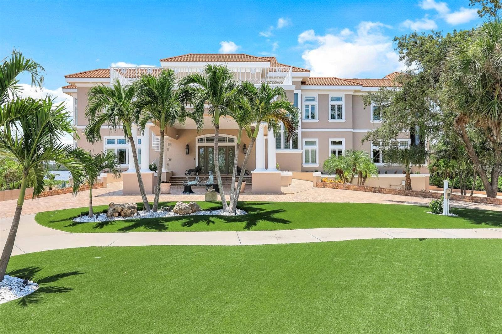 7159 MANASOTA KEY ROAD, Englewood, FL 34223 front view with circular driveway