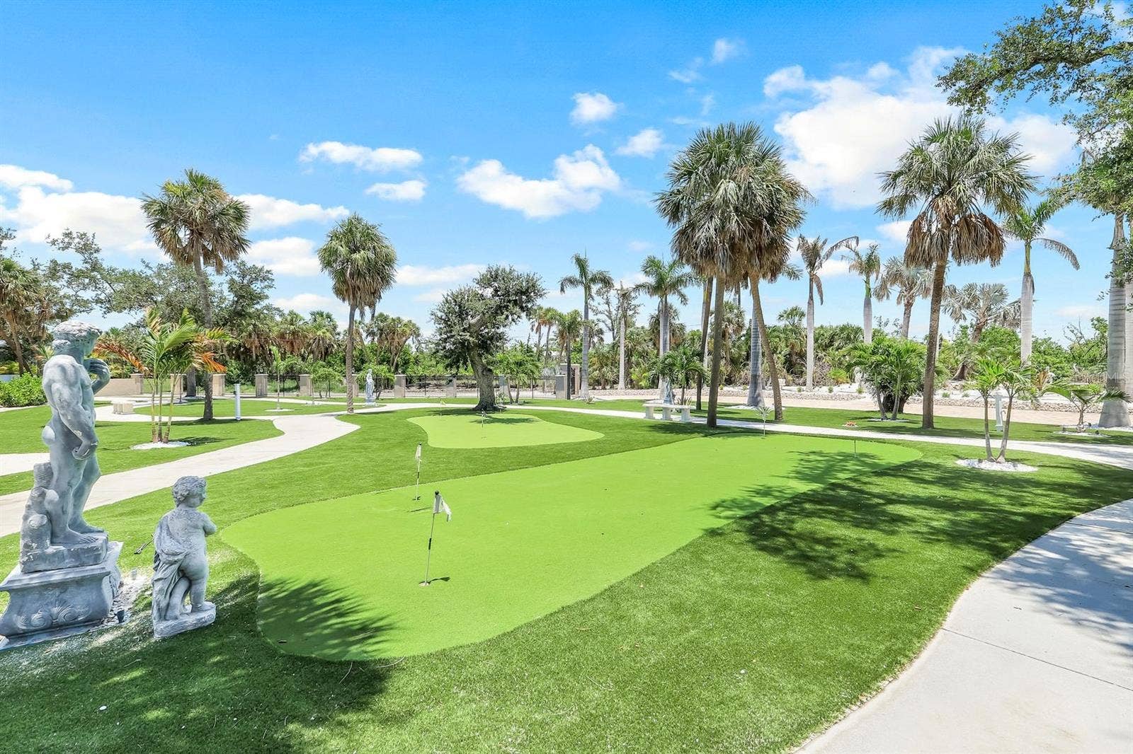 7159 MANASOTA KEY ROAD, Englewood, FL 34223 Putting greens stunning landscaping