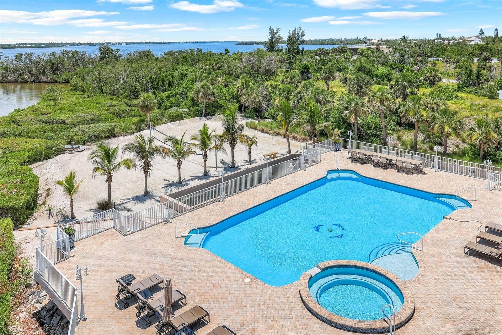 7159 MANASOTA KEY ROAD, Englewood, FL 34223 beautiful heated pool with spa and beach volley ball court and bocce court