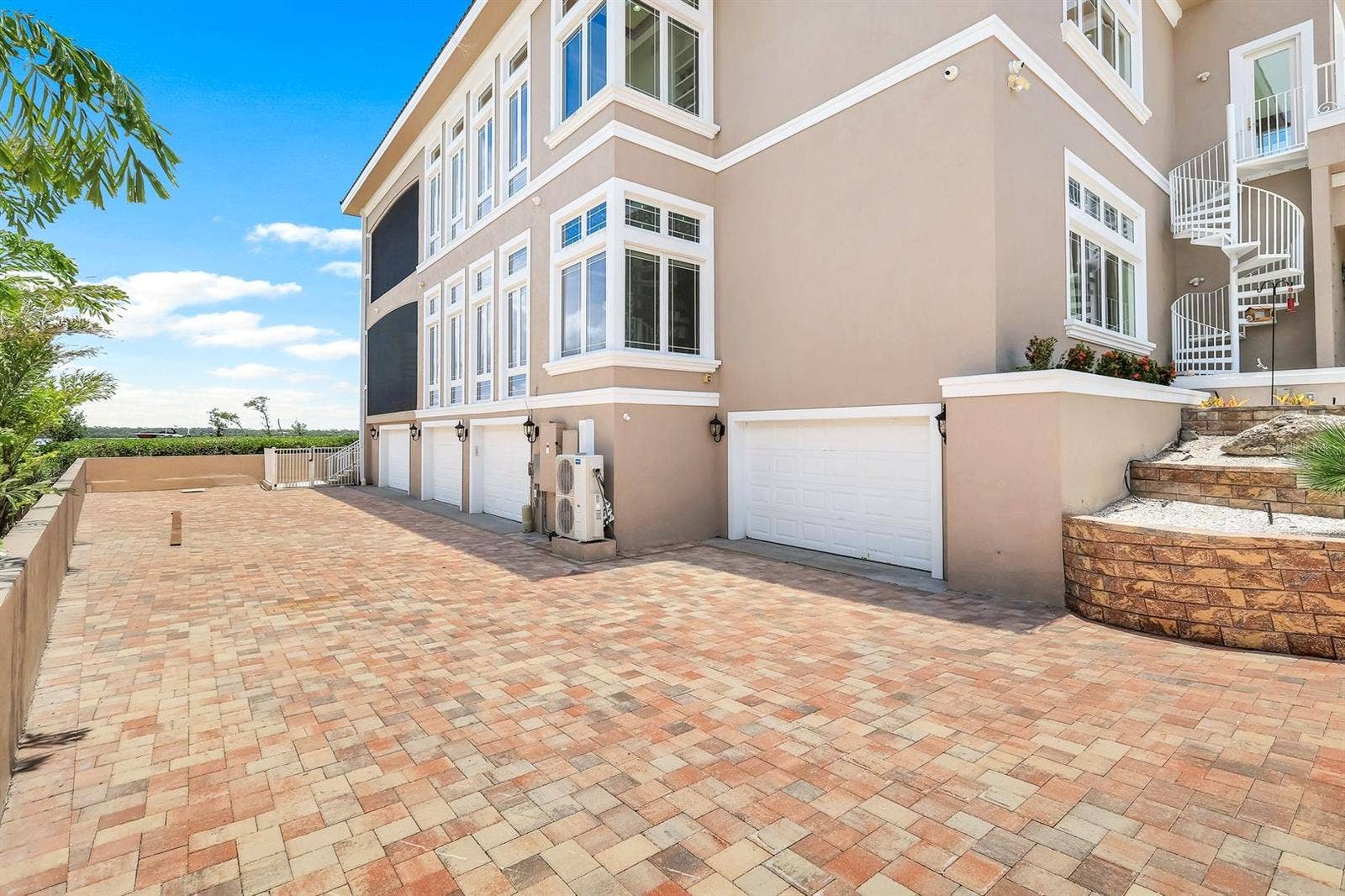 7159 MANASOTA KEY ROAD, Englewood, FL 34223 Entrrance view of garages