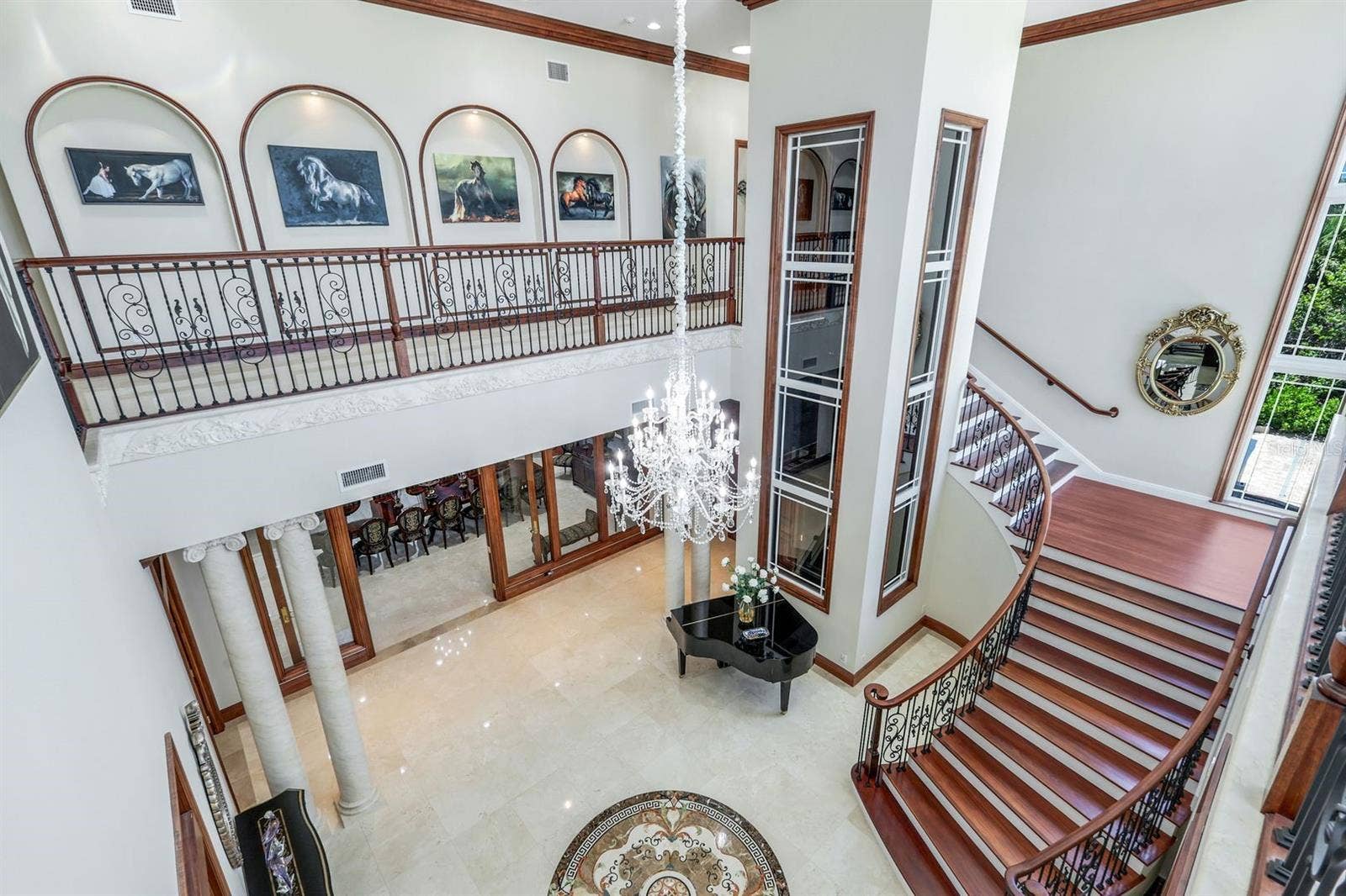 7159 MANASOTA KEY ROAD, Englewood, FL 34223 elegant staircase and glass elevator