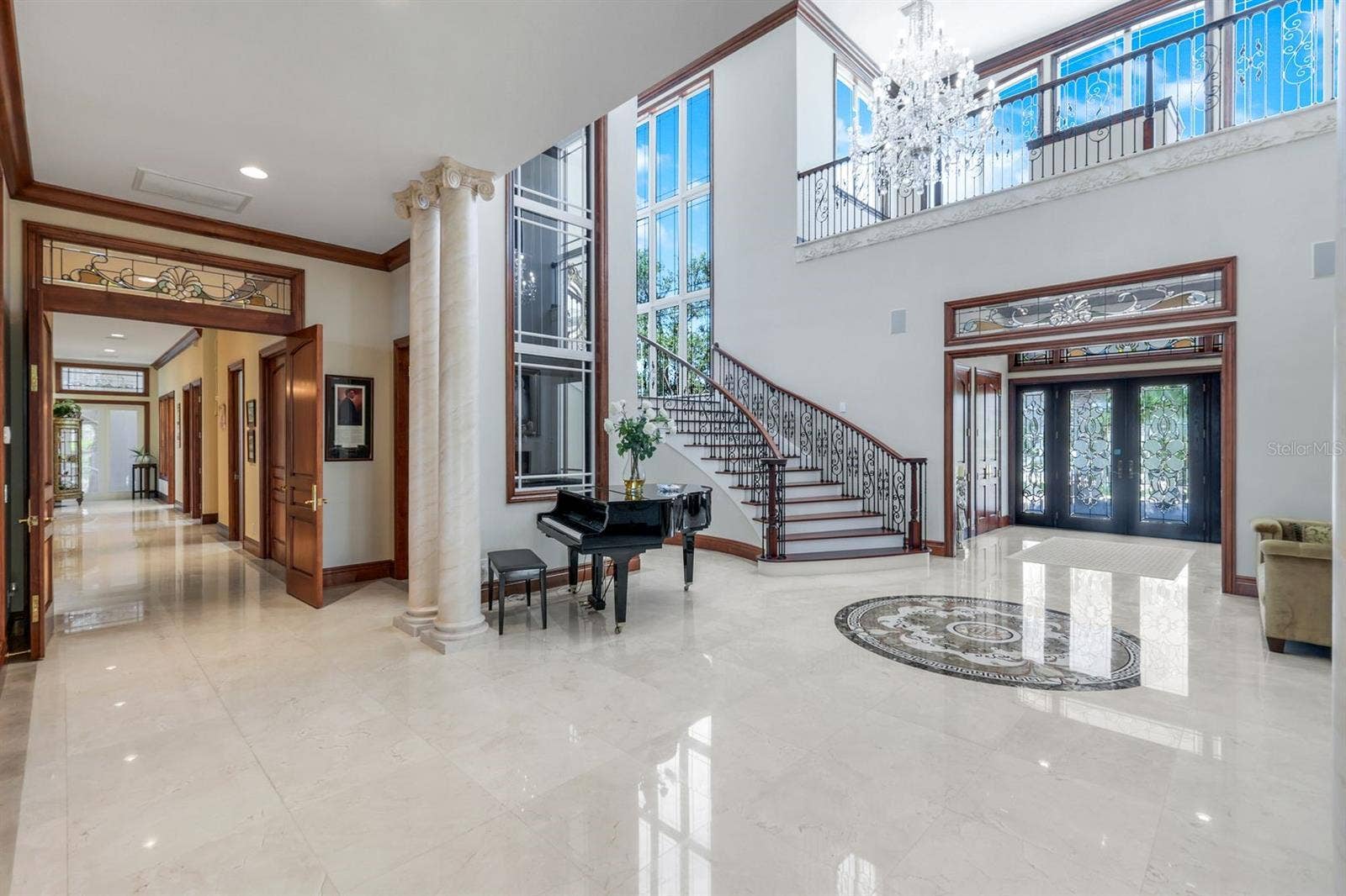 7159 MANASOTA KEY ROAD, Englewood, FL 34223 front foyer with glass elevator that acesses all floors fron garage to roof top