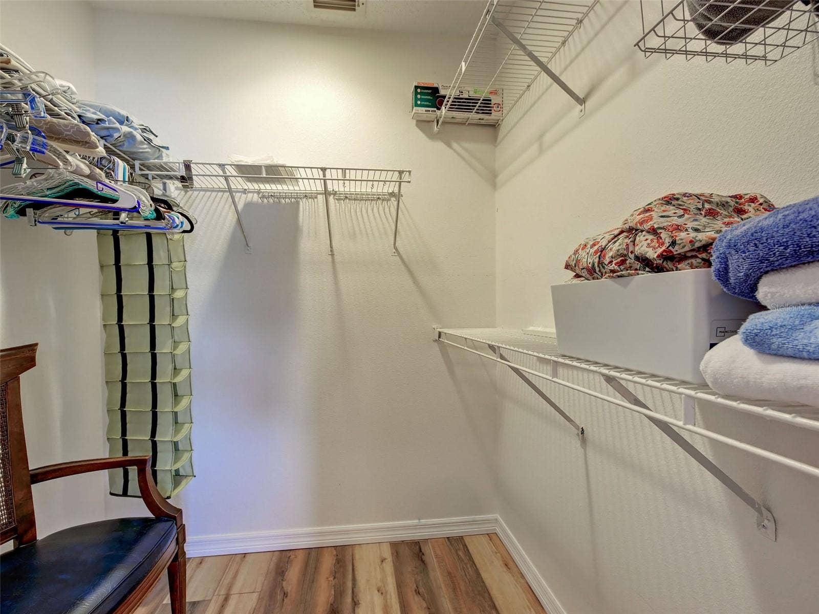 primary bedroom walk in closet, primary bedroom also has an ensuite bathroom