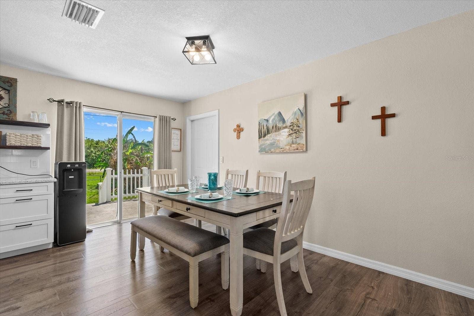 2600 CHARLENE STREET, Punta Gorda, FL 33950 Dining area with sliding glass doors to the deck