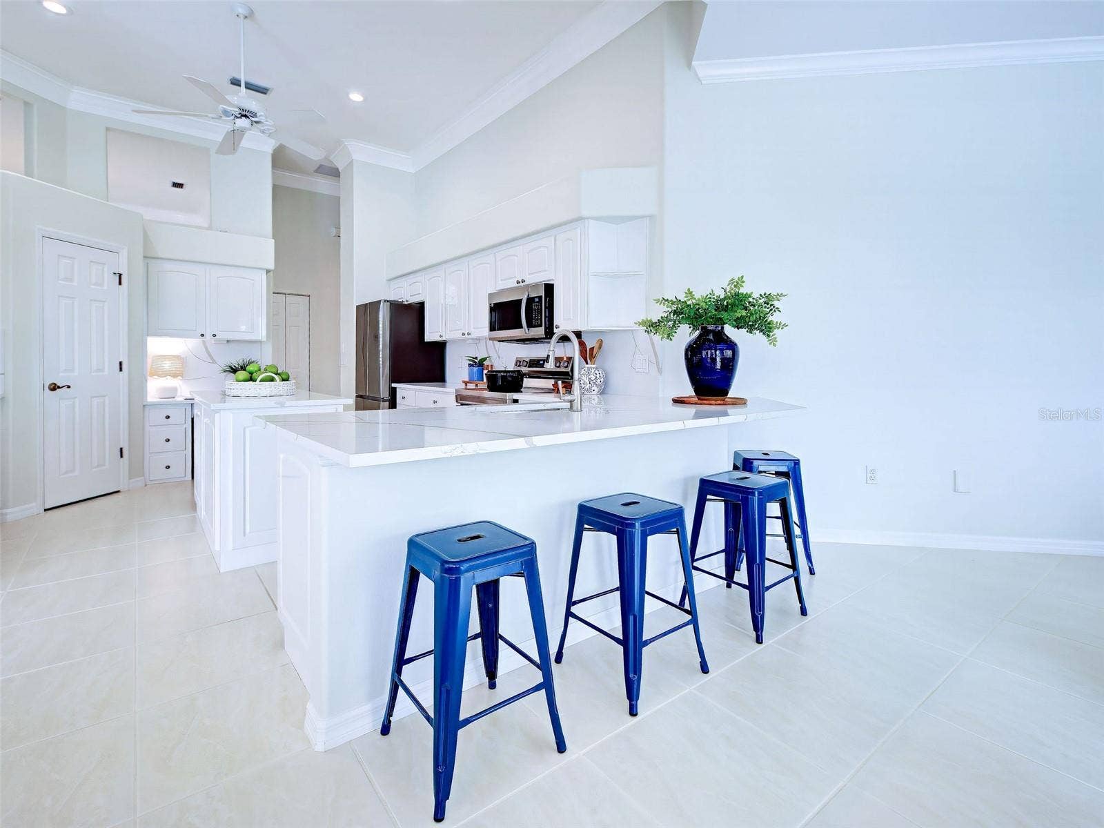 Keep the chef company at the large breakfast bar.
