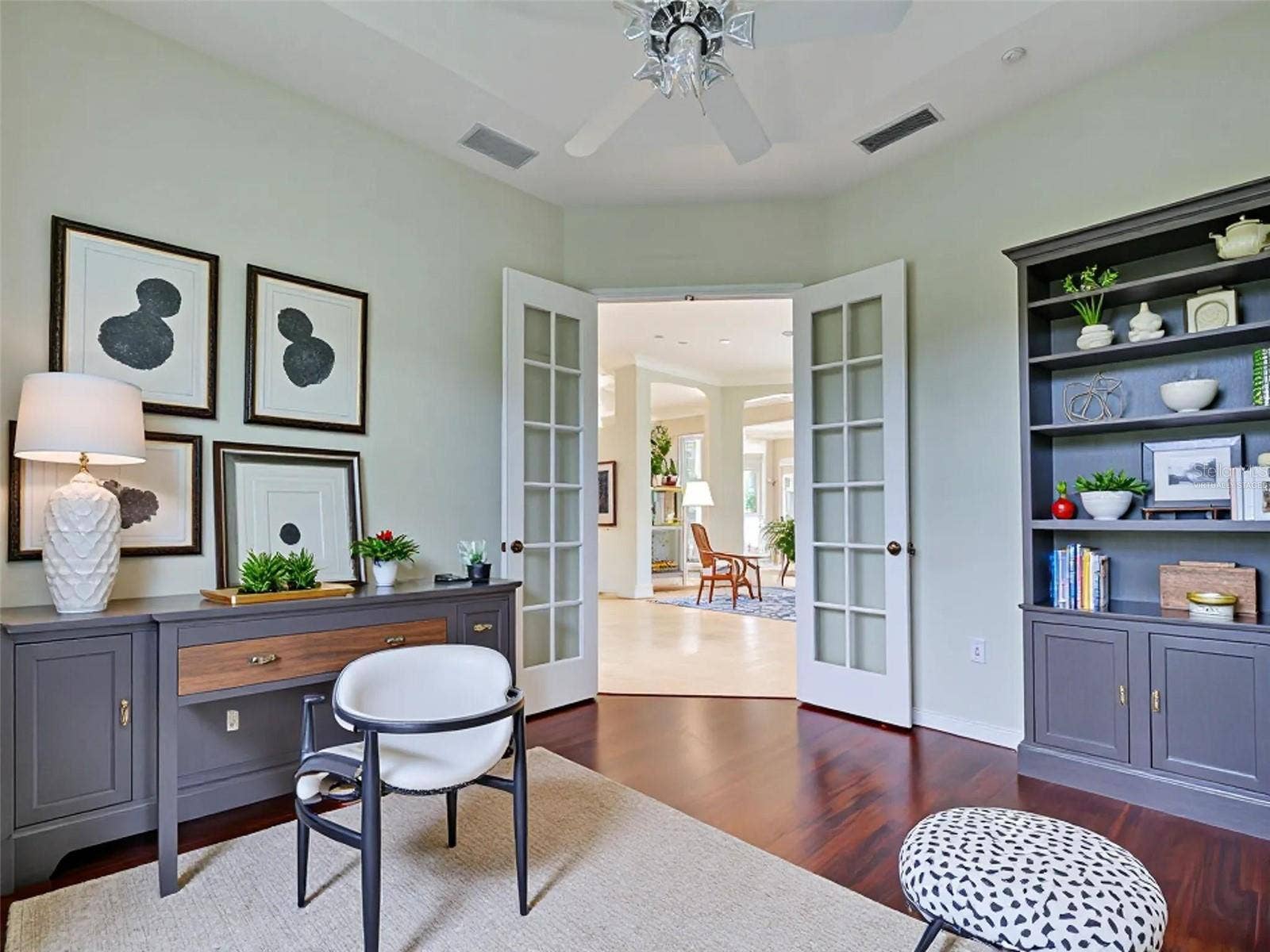 Virtually staged office is large enough to be used as 4th bedroom.