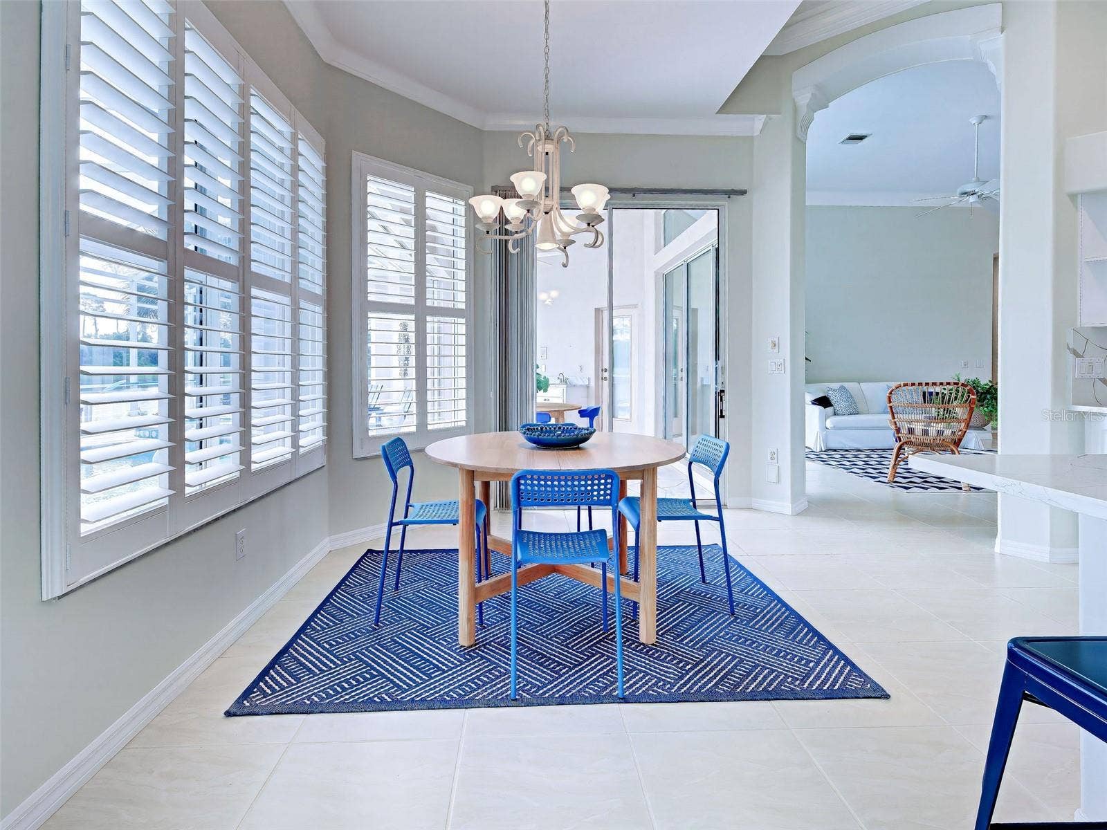 Or enjoy a casual meal in the breakfast, conveniently located just off the kitchen with sliders to the lanai.