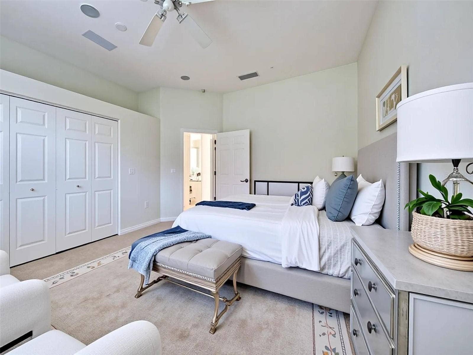 Virtually staged 3rd bedroom with large closet.