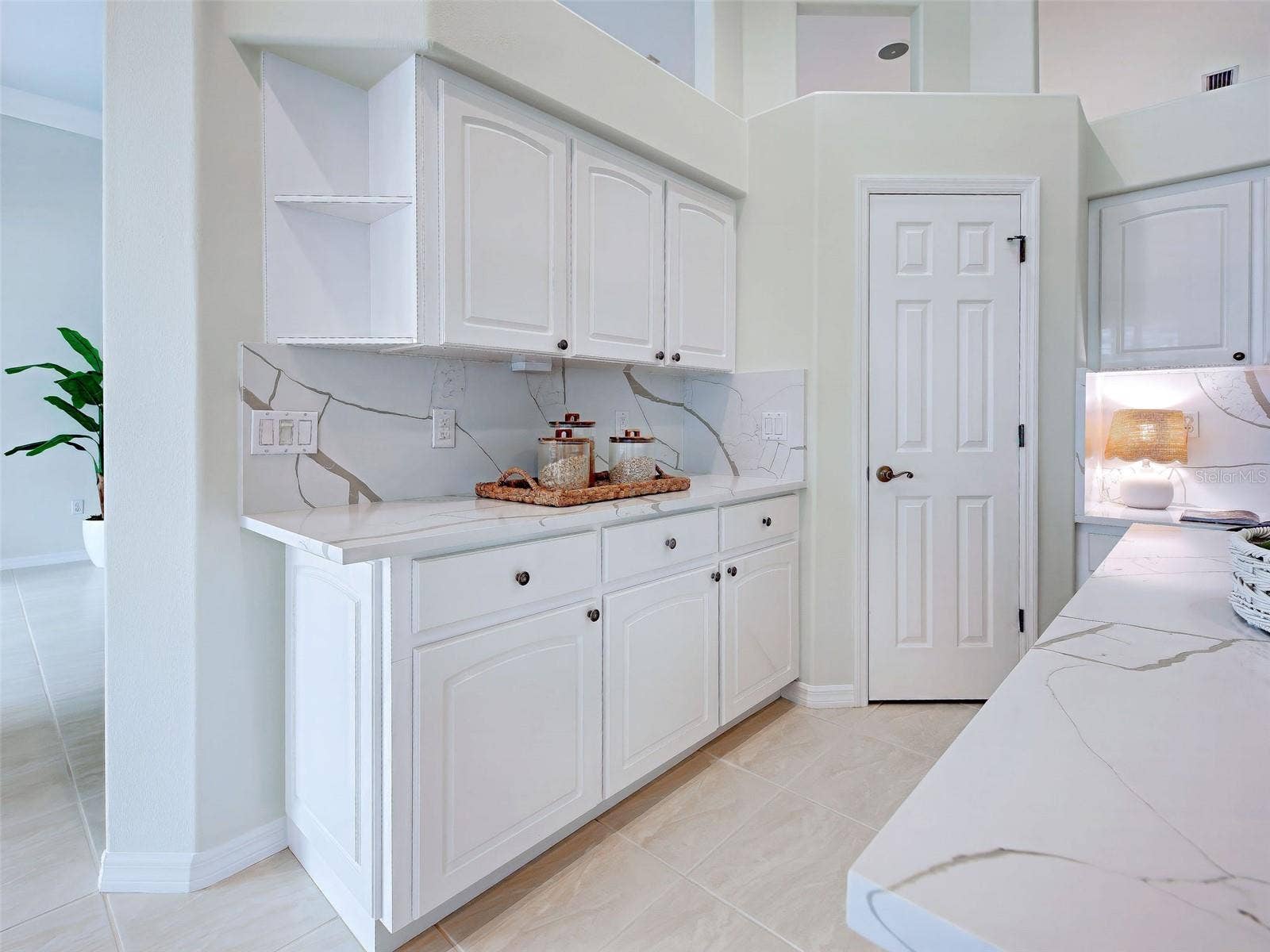 More cabinets and so many gleaming counters make meal prep a delight.