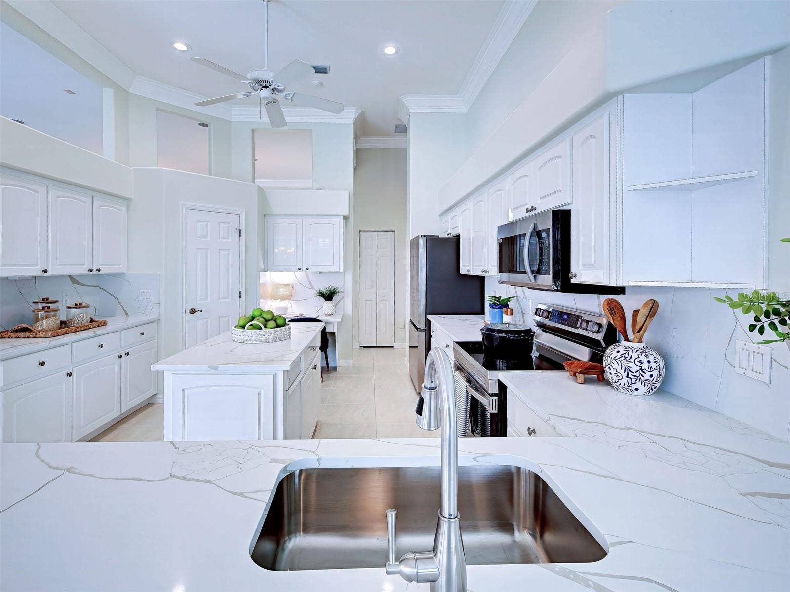 Another view of the spectacular kitchen with so much prep and storage space.