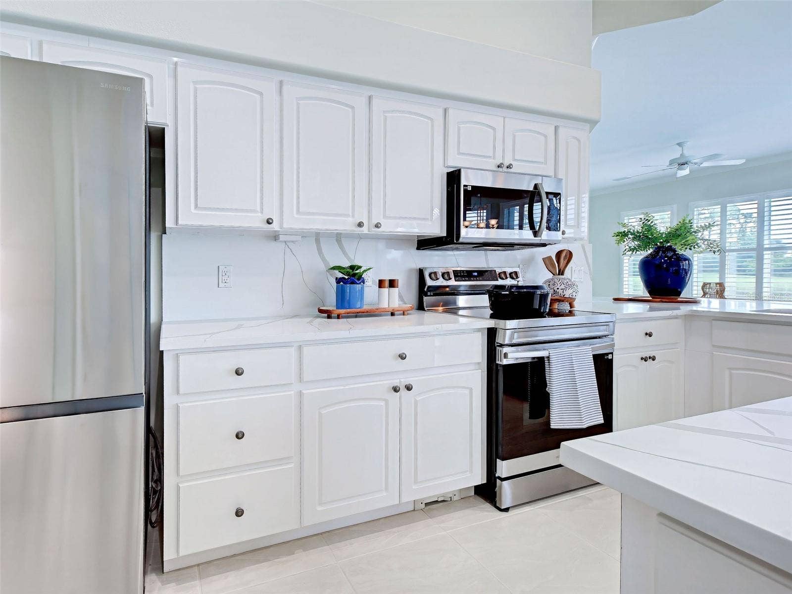 Kitchen has brand-new stainless-steel appliances and so much storage.