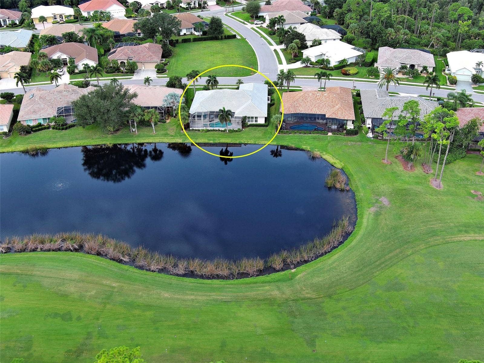 Blue water and green golf course views could be yours.
