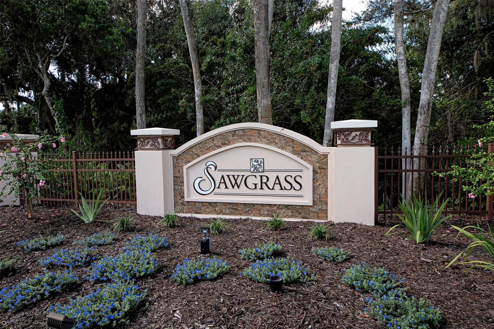 Sawgrass community is in an ideal location - 4 miles to Venice Island, near many stores, restaurants, new Sarasota Memorial Hospital, yet tucked away from the hustle and bustle.  Low HOA fees and no CDD fee are pluses.