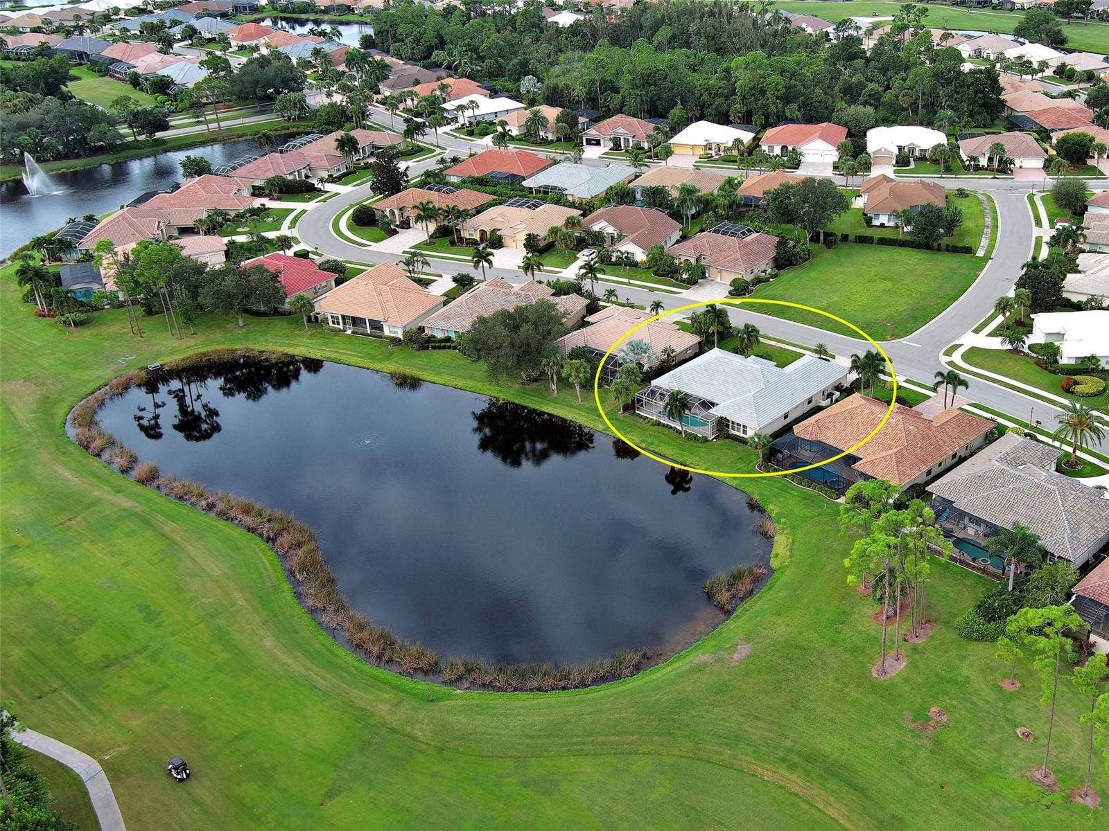 Eagle's view of 692 Egret Walk with lake and 2nd fairway golf course.